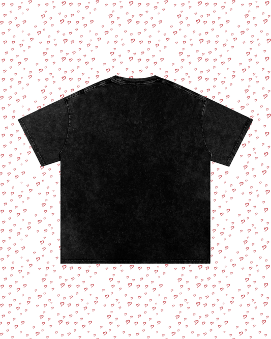 Black t-shirt on a white background with small red heart patterns