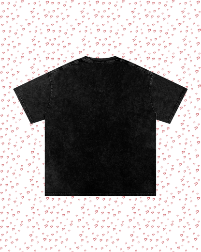 Black t-shirt on a white background with small red heart patterns