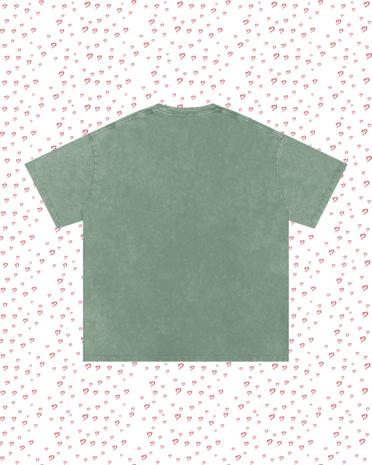 Green t-shirt on a white background with small red heart patterns