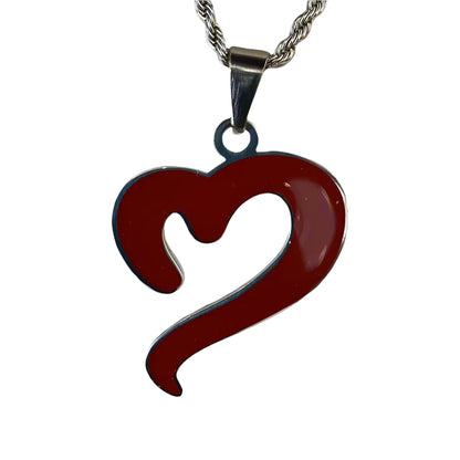 Close-up of the heart pendant on the With Heart silver chain by Mousawi - polished detail shot.